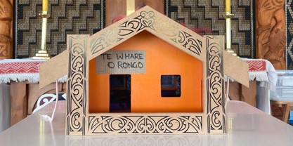 Te whare o rongo model sitting on table
